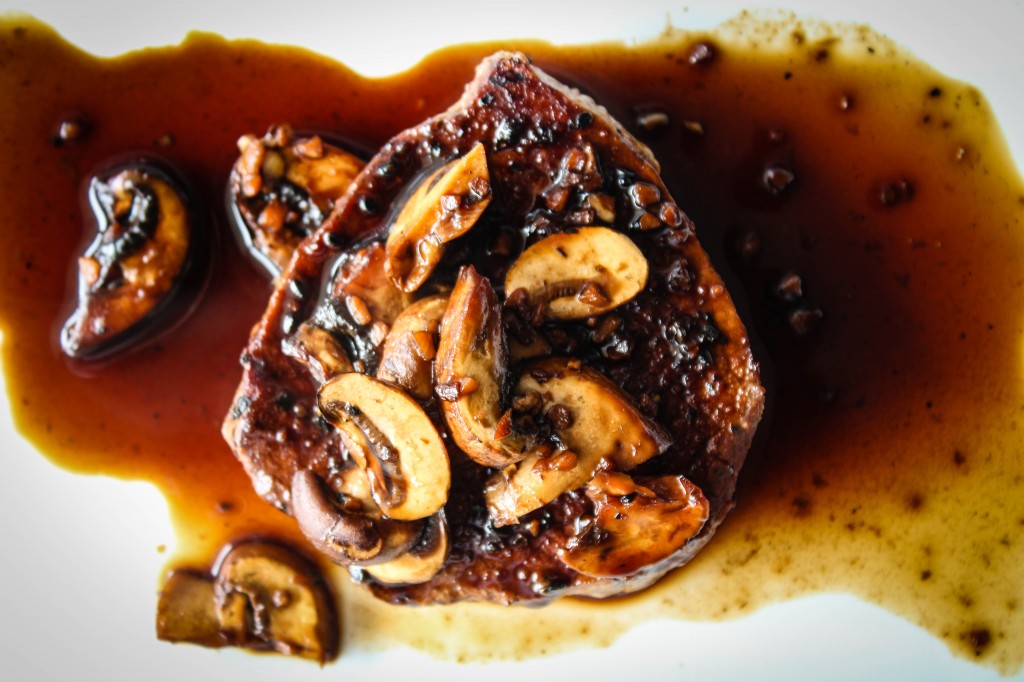 steak with mush glaze above