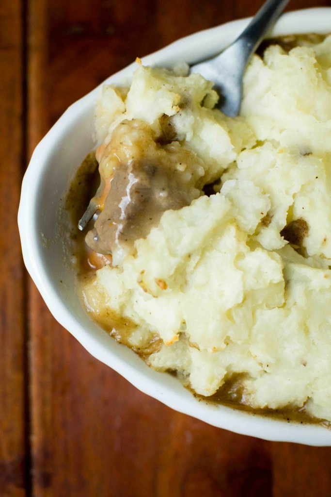 Midwest Rancher's Pie || bakesinslippers.com || beef || dinner || mashed potatoes fork above